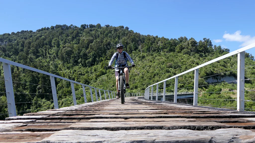 Biking across the lovingly restored Hapuawhenua Viaduct on the Ohakune Old Coach Road (Lee Slater)